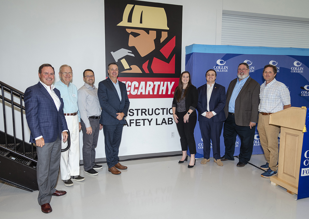 Officials from McCarthy Construction join Collin College administrators for the dedication of the new construction safety lab.