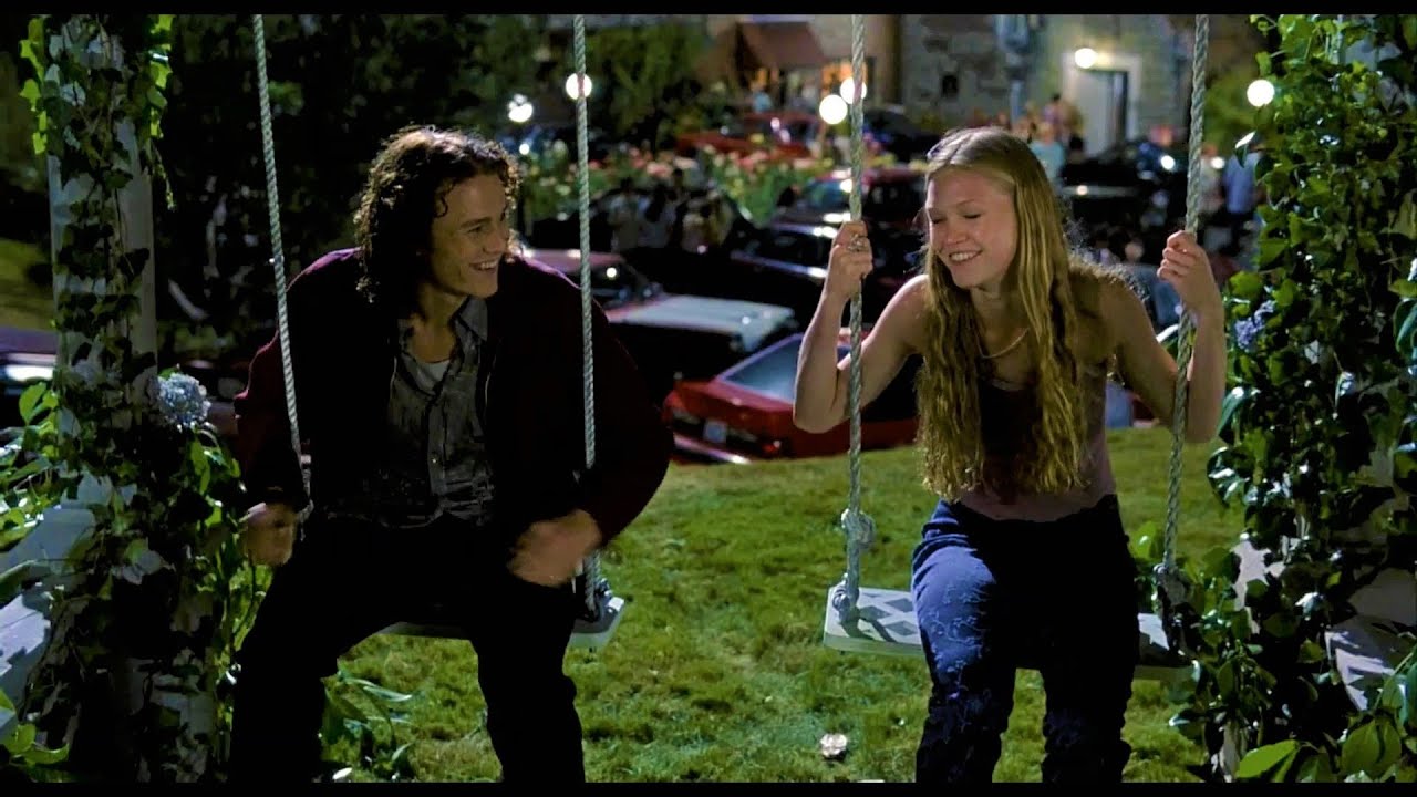 boy and girl on swings