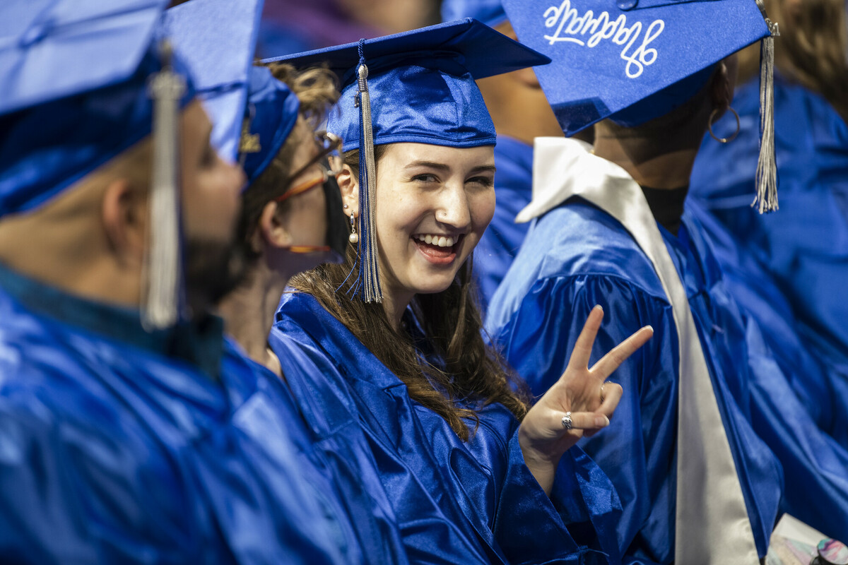 graduate with cap and gown 