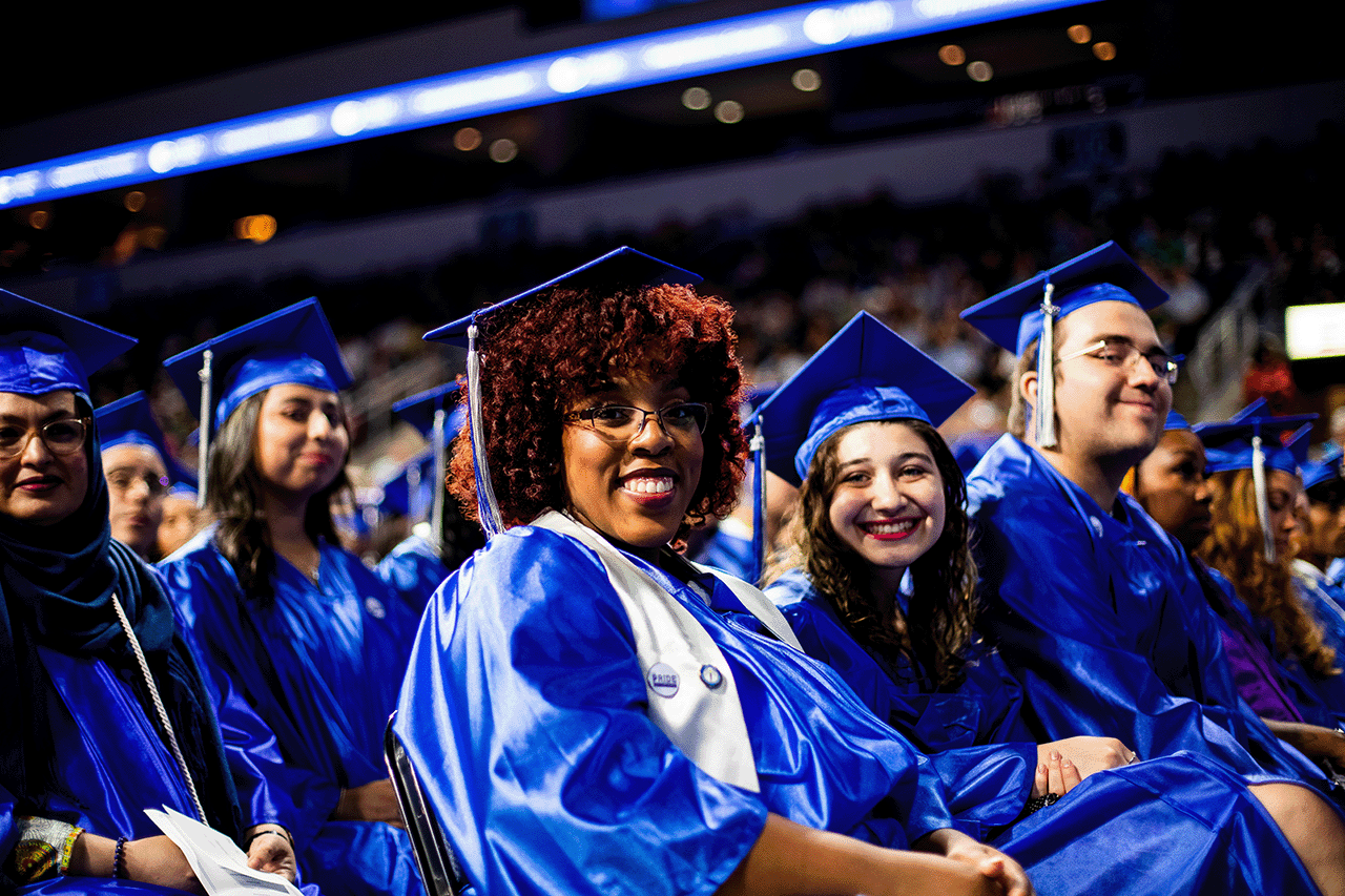 Graduates celebrate their graduation at Commencement