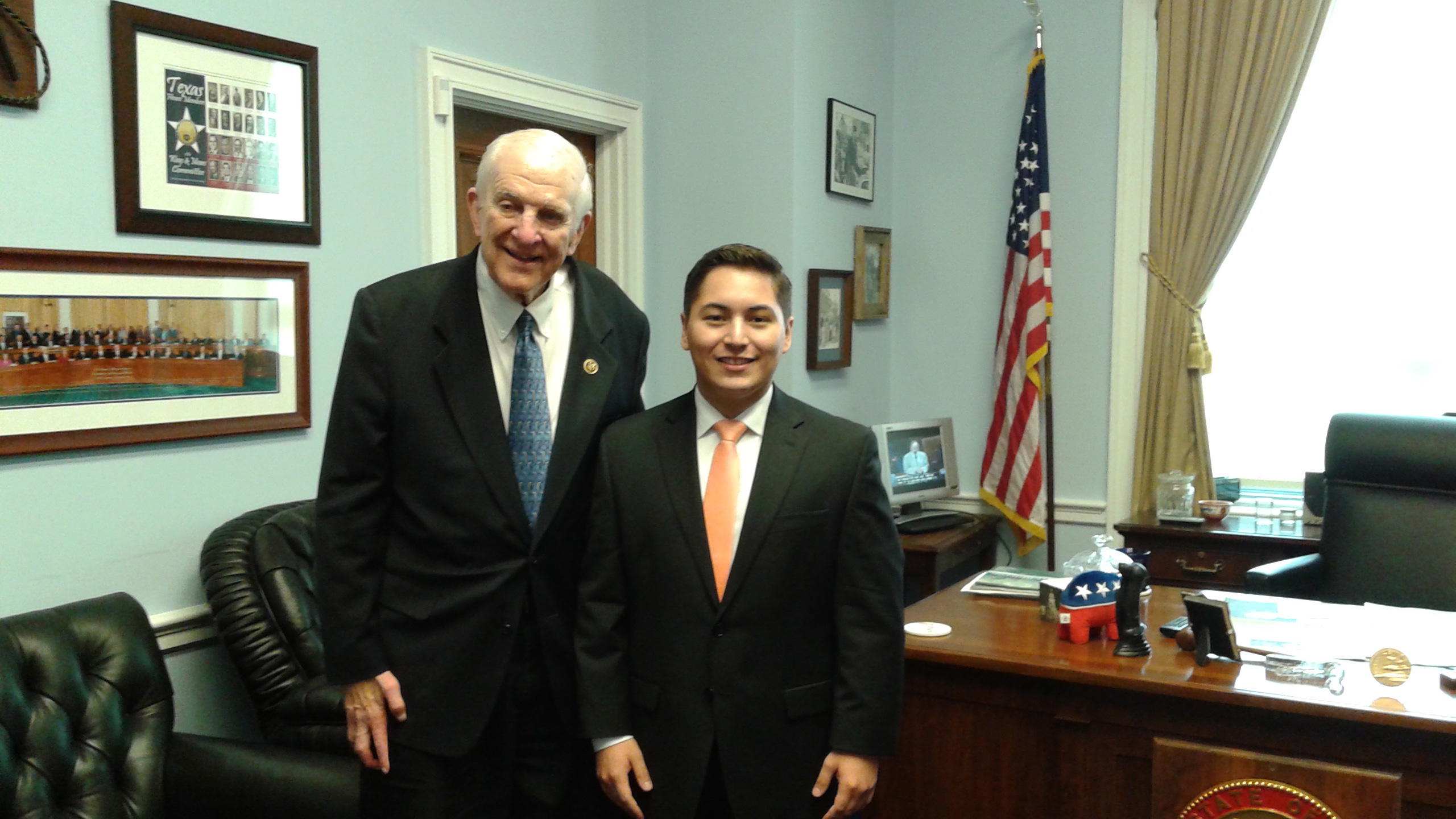 Collin College student Fernando Osornio receives the Congressional Gold Medal from U.S. Rep. Sam Johnson.