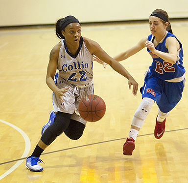Taylor Jackson dribbles up the court for Collin College's Cougars Women's Basketball Team
