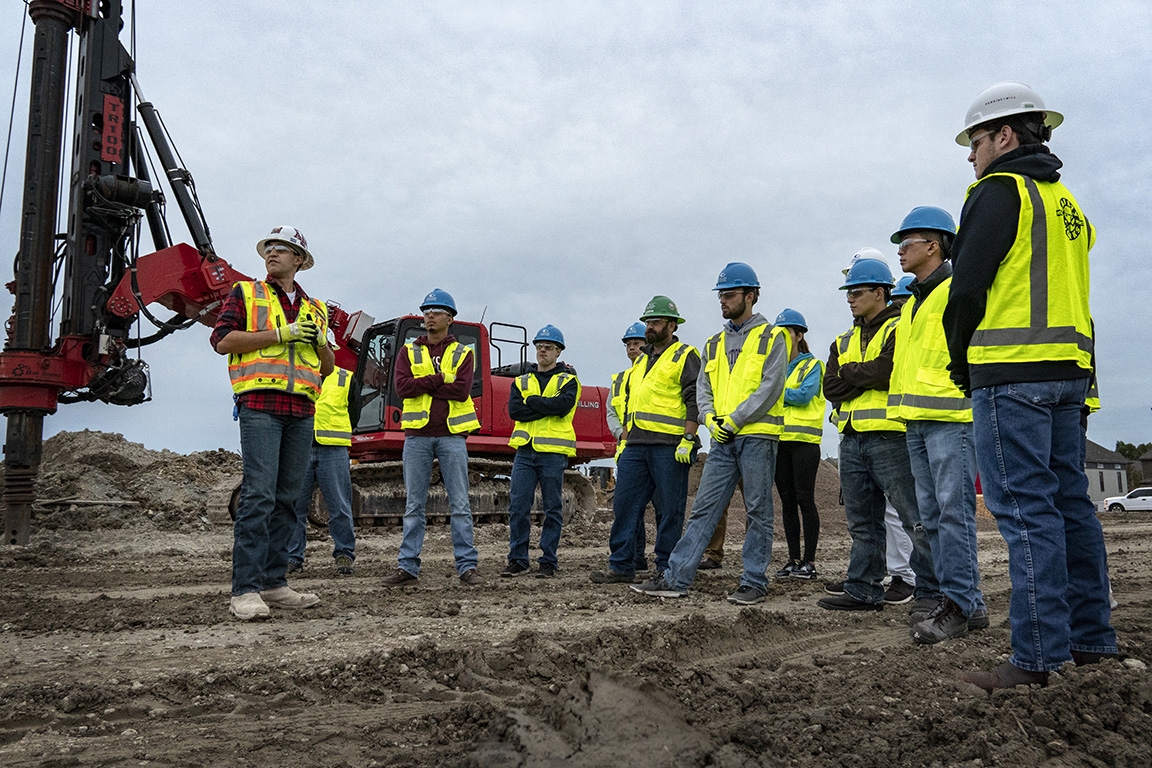 Members of the Collin College Construction Management class stand on the site of the Technical Campus in 2019