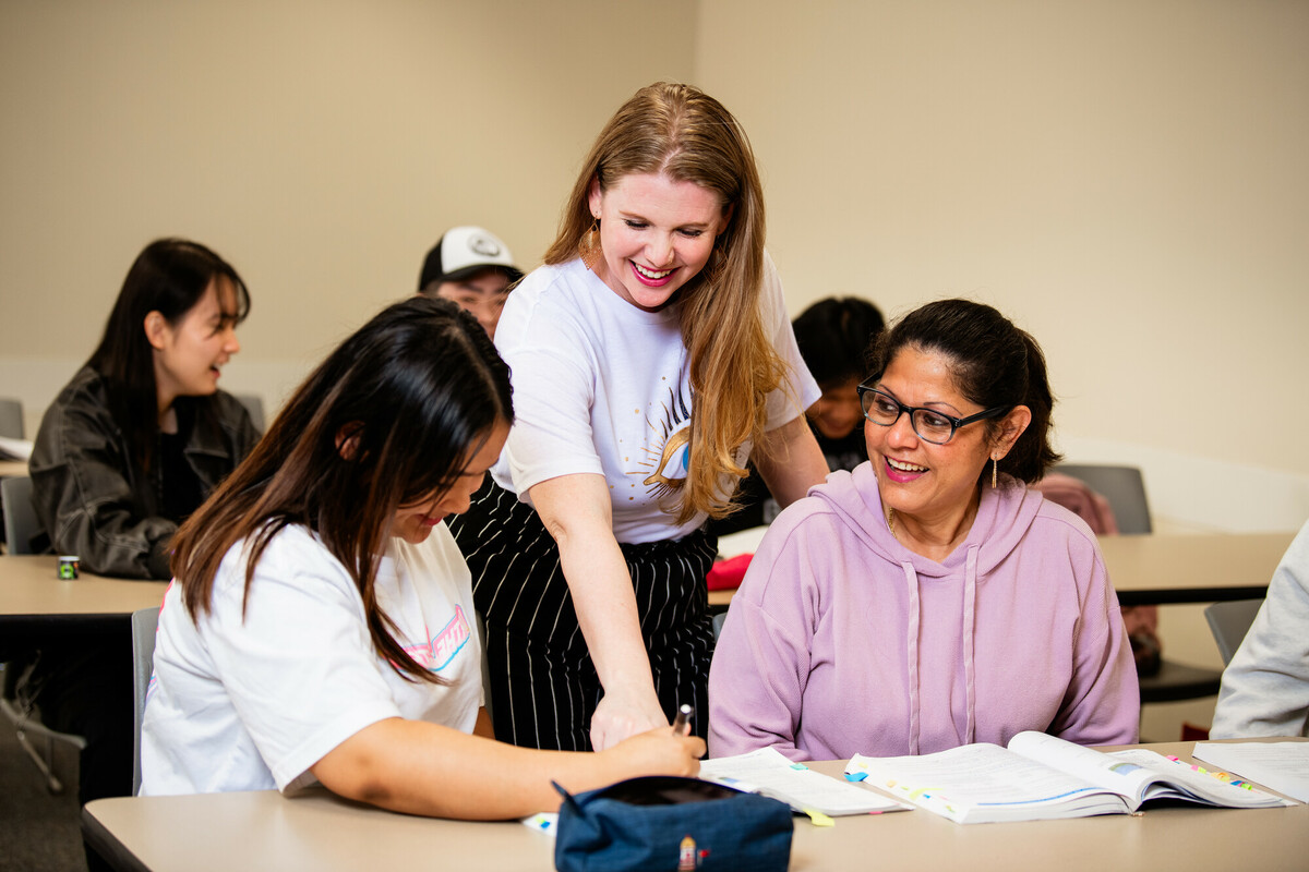 Photo by Sara Carpenter, Collin College photographer Students in a Spring 2024 English as a Second Language (ESL) course interact with a professor. One of the Texas Workforce Commission’s grant’s focuses will be on providing ESL education for adults in Collin College’s service area.