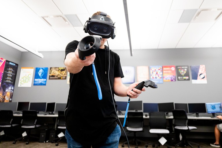 Collin College student tries out the virtual reality equipment in animation class taught by Professor Marshall Pittman at the IT Center at the Frisco Campus.